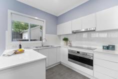 2/30 Robertson Street Helensburgh NSW 2508 This beautifully presented duplex is perfectly appointed to enjoy low maintenance indoor/outdoor living in a quiet, yet convenient location. It is set in a boutique complex of four, within walking distance of town centre with shops and cafes , local schools, parklands and public transport. Open plan living enjoys an abundance of natural light. Modern kitchen features stainless steel appliances and ample cupboard space Glass doors allow seamless access to the alfresco patio area and low maintenance yard. Three spacious bedrooms, with BIR's The master complete with ensuite Spacious family bathroom Ducted air conditioning throughout Remote garaging with internal access and abundance of storage Perfectly positioned in a walk to everything location Stunning Stanwell Park Beach is less than a 10 minutes drive. Enjoy Coastal living without the huge price tag. Helensburgh is one of the only remaining areas where you can find a peaceful regional lifestyle less than an hour from Sydney. It offers all of those charming lifestyle benefits that one would associate with small town living:- bushwalking, swimming holes, bike tracks, sporting clubs, cafes and of course plenty of friendly people.