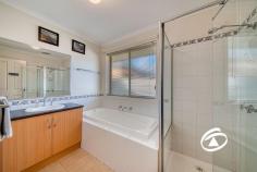 33 Oaklands Way Pakenham VIC 3810 $700,000 - $770,000 Timeless in style and beautifully presented this family home, neatly tucked away in a prime pocket of Lakeside is perfect for all buyers who have been searching for a trustworthy, forever home. Sitting on a large 694sqm corner allotment with immediate street appeal this versatile floorplan offers that can be configured to a multitude of requirements. The master suite offers a dressing room and ensuite featuring a double shower and corner spa. Two more bedrooms at the rear of the home feature built-in robes serviced by a family bathroom and a separate toilet. Further emphasizing its fine family credentials is a large front formal lounge, well-appointed kitchen with adjoining living/dining area, plus the added bonus of an additional rumpus/theatre room (optional 4th bedroom). Completing the picture is a huge covered outdoor entertaining area that overlooks the manicured rear lawn and border gardens Add a remote-control double garage with drive-thru access, additional side access for the boat/caravan, solar panels, water tank and two sheds. Close by to local shopping, schools, public transport and some of Pakenham’s best amenities, this one won't hang around for long.