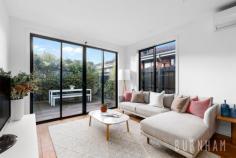 94 Alexander St Footscray VIC 3011 $850,000 - $900,000 This modern, cosmopolitan home fuses contemporary and low maintenance living to create the ultimate townhouse lifestyle. Located in the burgeoning suburb of Seddon, with its own street frontage, the value and appeal of this home is only set to grow. Upon entry to the home, you are greeted with bright spaces and impressive timber floors. The open plan living and dining area is an entertainer’s dream, this zone opens to the private courtyard, creating a peaceful ambience by bringing the outdoors in. The heart of the home, the kitchen, is sure to impress with grand proportions. It features a smoke mirror splashback, gas cooktop, stone benchtops, a double sink, island bench/breakfast bar, and ample storage space. The lower level is completed by a light-filled study, allowing for pleasant work from home situations. The airy master suite on the upper level is serviced by an ensuite with a large shower and vanity with storage. The second bedroom has ample space and overlooks the street below, making it the perfect place to unwind after a long day. This bedroom is serviced by the central bathroom that is wrapped with neutral tones and features a shower and vanity with storage. Located approximately 8kms from the city, enjoy an abundance of amenities at your doorstep. Middle and West Footscray train station, parklands, Victoria and Charles street shops and cafes, Footscray city and numerous schools are within a short walk. Additional features: – European laundry – Split system heating and cooling in the bedrooms and living area – Carport – Private courtyard