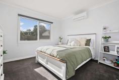 18 Finlay Street Frankston VIC 3199 $870,000 - $950,000 Sparkling in the afterglow of a stunning total renovation delivering a suite of sumptuous finishes to complement the generous light-filled spaces, this four-bedroom home allows for very comfortable living and fabulous alfresco entertaining in a family-friendly location. An easy walk to restaurants, cafes, cinemas, schools, the skate park, recreational facilities and the beach, living is easy from this central locale, which will meet the needs of every age and stage, from kindergarten to college. Cleverly crafted over an expansive single level with a family-focused design, the enormous primary living area sits between a high cathedral ceiling and polished timber floors with a bank of windows and sliding glass doors softened by floor-to-ceiling sheer white curtains. Fitted with sleek stone benchtops, gloss white cabinetry, dishwasher, oven and gas cooktop, the contemporary kitchen is radiant beneath a skylight window, while outside the huge barbecue patio basks in north-facing light. Cradled in serenity in the junior wing of the home, the two rear bedrooms boast walk-in robes, split-systems and easy access across the hall to the kids' bathroom, leaving parents to the peace of the master wing with two additional bedrooms and a full second bathroom opposite the formal lounge. Only 100 metres to the Beach Street shops and zoned for Frankston High School, plush charcoal carpeting, rollerblinds, matte-black tapware, an ambient log burner, ducted heating, attic storage, bistro deck, covered verandah, shed, garage and double carport are among a list of extras of this wonderful home.