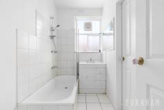 3/93 Droop St Footscray VIC 3011 $350,000 - $385,000 A two-bedroom apartment like this is a rare find; with spacious rooms and the advantages of a ground floor position at the rear of the block. With newly laid carpets and a fresh lick of paint, this home is move-in ready. It presents itself as a great opportunity for downsizers, first homebuyers and investors alike. Upon entry, you are greeted with the light-filled spacious living area. This zone opens to the communal yet private backyard, bringing the outdoors in and creating a peaceful space to unwind. The functional kitchen is clean and well-kept, with an abundance of storage, gas cooker, double sink, and dishwasher; the kitchen is so large, it has ample room for a dining table. Both bedrooms are spacious and light-filled with mirrored built-in robes and new carpets; posing as quiet and comfortable spaces. The apartment is serviced by a central bathroom with tub, vanity with storage, laundry facilities including a trough and a separate toilet. Located approximately 8kms from the city, in Melbourne’s budding Inner West, enjoy all the amenities Footscray has to offer. Victoria University, Footscray Park, Barkly street renowned bars and restaurants, the new Western Hospital, Maribyrnong River and Footscray Train Station are all within a walk; not to mention a tram stop virtually at your doorstep. Additional features: – Rental return of approximately $350 per week – Separate, undercover carport – North facing backyard – Linen cupboard