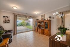 33 Oaklands Way Pakenham VIC 3810 $700,000 - $770,000 Timeless in style and beautifully presented this family home, neatly tucked away in a prime pocket of Lakeside is perfect for all buyers who have been searching for a trustworthy, forever home. Sitting on a large 694sqm corner allotment with immediate street appeal this versatile floorplan offers that can be configured to a multitude of requirements. The master suite offers a dressing room and ensuite featuring a double shower and corner spa. Two more bedrooms at the rear of the home feature built-in robes serviced by a family bathroom and a separate toilet. Further emphasizing its fine family credentials is a large front formal lounge, well-appointed kitchen with adjoining living/dining area, plus the added bonus of an additional rumpus/theatre room (optional 4th bedroom). Completing the picture is a huge covered outdoor entertaining area that overlooks the manicured rear lawn and border gardens Add a remote-control double garage with drive-thru access, additional side access for the boat/caravan, solar panels, water tank and two sheds. Close by to local shopping, schools, public transport and some of Pakenham’s best amenities, this one won't hang around for long.