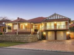 10 Sherbrooke Heights Noranda WA 6062 Sitting proudly amongst homes of distinction on arguably Noranda’s most prestigious street, lies this resplendent, double storey Federation Inspired manor. Designed to cater for the largest of families with 5/7 bedrooms, 4 bathrooms, 4 separate living areas, wrap-around alfresco overlooking pool and off street parking for up to 11 cars, the space and versatility it offers is simply sublime. Complete with picturesque views over tree lined Sherbrooke Reserve, and it really doesn’t get much better than this. WELCOME HOME to 10 Sherbrooke Heights. Distinguished by its stunning Federation facade, a sweeping curved staircase first welcomes you upon arrival up to the covered wrap-around verandah. As the sun rises, sit back and enjoy a morning cuppa, whilst after work a glass or two of vino, as you supervise the kids playing in the park across the road. Beyond the beautiful stained glass front door, step inside and be captivated by the home's beautiful period features, including detailed skirting and cornicing, high ceilings and ceiling roses, all of which are commonplace throughout. Designed for both formal gatherings as well as those intimate family moments, to the left of the entry foyer is the formal living room. Bright and spacious with stunning park views framed perfectly by the feature bay window, enjoy afternoons conversing over high tea with friends, whilst at night, snuggle up in front of the fireplace and loose yourself in the flickering orange flames. Enjoying the same leafy backdrop, across the entry foyer you’ll discover the formal dining room. The perfect spot for your next dinner party, you even have a servery hatch from the kitchen for added practicality – how good is that! Transition down the central corridor a little further and you’ll arrive at the commodious living, dining and kitchen area, the true heart of the home and the ideal social hub for family living and entertaining. Bound to leave the resident chef salivating, the well equipped kitchen boasts ample built-in storage and a plethora of bench space, a pyrolytic wall mounted oven, stainless steel gas cooktop with rangehood , double fridge recess with water tap connection, dishwasher recess, island bench, with the breakfast bar and open concept ensuring no one misses out on the conversation. Handcrafted timber cabinet’s finish the space perfectly, whilst the patterned subway tile splashback helps maintain the Federation charm. The expansive living area itself provides plenty of space for your large flat screen TV and favourite comfy sofas, whilst the casual meals area provides the perfect platform for everybody to gather around and share stories of the day gone by. Exposed brickwork and terracotta coloured tiles add a sense of warmth to the space, whilst sliding doors provide a seamless transition with the outdoors in a testament to modern family living. Practically designed and beautifully appointed, the backyard itself is simply an entertainer’s paradise, with something for everyone to enjoy. Just imagine, a balmy summer's afternoon, sitting back on the timber daybed, with a glass of your favourite beverage in hand. The kids are enjoying a game of Marco Polo in the lagoon style pool, whilst the sausages sizzle away on the BBQ. Then when lunch is ready, everybody can gather under the huge pitched roof alfresco and devour the home cooked feast! The ultimate entertaining platform, you even have a manageable patch of lawn along the back for the kids (human or fur) to enjoy. Back indoors, and located behind an unassuming sliding door off the meals area is one of the biggest games rooms we’ve ever seen! Enjoying direct access to both the rear alfresco and front balcony so you can soak up the picturesque parkland views, be mesmerised by its sheer volume and versatility. Large enough to easily accommodate 100 guests, whatever the occasion might be, this room has you sorted! Reminiscent of a luxurious 5 star hotel, indulge and unwind in ultimate style after a hard day’s work in the sumptuous king sized master suite. The relaxing haven you’re bound to love, “His & Hers” built-in robes ensure there’s no shortage of storage space, whilst the lavishly appointed ensuite is equally impressive. Complete with double sink vanity, extra large shower, separate W/C and romantic corner spa, just picture yourself at the end of a working week immersed in the bubbles, enjoying a good book, with a glass of your favourite drop in hand. Bliss. Tucked away in the children's wing are a further four bedrooms, all generously sized and all with built-in robes. The Federation style family bathroom features a separate shower and bathtub, whilst next door you have a separate W/C with hand basin and mirror. Ideal for visiting family and friends, bedroom four overlooks the rear garden, and comes complete with its own ensuite featuring shower, hand basin and W/C. A humongous laundry with oodles of storage, built-in ironing station, sewing bench and external access rounds out the accommodation features on this level. Descending down a flight of stairs and you’ll arrive at the undercroft level of the home. Headlined by a huge double garage with workshop area, off to the side are two further versatile rooms. Having been previously used as a gym and work from home office, with one of them including an ensuite with W/C, the options are endless as to how you configure the space. Maintain their current uses, have two further bedrooms or create a teenagers/guest retreat with bedroom and separate sitting room - it's up to you! Expertly designed to accommodate your families every need, additional features include ample built-in storage, ducted evaporative air-conditioning supplemented by 3 split system units, ducted valet vacuum system throughout, security screens to all opening doors & windows, gas bayonets, shoppers entrance, bore reticulation plus solar panels to keep those electricity bills down. Nestled in a tightly held pocket of Noranda amongst well maintained homes of distinction, you couldn't ask for a better spot to raise your family. Just 10kms from the CBD, there are multiple bus routes close by, plus the proposed Noranda Metronet Station will be a mere 5 walk from your front door – every commuters dream! Hawaiian's Noranda is within arm's reach, whilst for bigger shopping trips the Galleria and Coventry Village are both not too far away. For those active or who have furry friends, there’s a lovely treelined park with playground directly opposite, the Noranda Sporting Complex is only a few minutes’ drive away, plus you have a myriad of scenic walking trails nearby at Lightning Swamp for a blissful stroll. Education wise, your spoilt for choice with several primary and secondary schooling options nearby. And lastly, with the world-renowned Swan Valley only a short car trip directly down Benara Rd, this is lifestyle living at its very best!