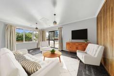 8 Castlereagh Crescent Macquarie ACT 2614 $1,189,000 With five bedrooms and three bathrooms, this spacious property has the clear potential to be a grand family home in a popular leafy suburb on the edge of the Belconnen Town Centre. Step inside and you'll instantly know this home is exciting. You'll be greeted by an internal green space, with the ground floor containing two generous bedrooms, one with an ensuite bathroom - making it a perfect separate living quarter for tenants or relatives. A hidden opportunity on the lower level is to be found behind that mysterious wooden door… where you'll discover the untapped potential of an enormous under-house space, perfect for lots of storage as is, or easily converted to a basement if you desire. Proceeding up the carpeted stairs, you'll find the property's beating heart. Families will love the layout of the three well-sized further bedrooms (all with built in robes), and the two bathrooms. Themed wood paneling and features add a classic retro aesthetic to this level of the home. The kitchen has everything you'll need, including a gas cooktop. The large kitchen window, with heightened outlook, floods light into the room. And the bench space provides all the room you'll need to knead dough, prepare hor d'oeuvres, make your own sausages ... whatever it is, you'll have fun with your friends and family doing it. The kitchen's classic parquetry carries into one of the two large upstairs living areas. The family/dining room and the lounge room both open onto the enormous tiled verandah which enjoys views across the Belconnen treetops. Cleverly positioned on the block to face north, this home takes full advantage of Canberra's stunning natural light. The large backyard is a blank canvas, just waiting on your bright ideas. For example, if you're a foodie, you might perhaps see the potential for a large kitchen garden with veggies, fruit trees and a chook run (if you're so inclined). Macquarie is, of course, a sought-after suburb. With grand trees and wide streets, your home in Macquarie will give you a very pleasant and enduring residential experience. Beyond that, you'll find great benefit in your easy access to both the Belconnen Town Centre (and other many local attractions and facilities) - and to the city! Walkable to the highly regarded Macquarie Primary School and Canberra High School, Macquarie shops and Jamison Centre, the popular reinvigorated Belconnen Fresh Food Markets, Big Splash water park and Westfield shopping mall, you'll have everything you need close by your home. Any nature lovers will appreciate The Pinnacle Nature Reserve just a few minutes walk away. There's a lot to love about this very spacious home - as is, or as you may choose to enhance it. • Expansive double brick home with north facing views towards Belconnen town centre • Freshly carpeted throughout • Seemless flow from both lounge room and family/dining room onto a large terrace via glass sliding doors • Spacious kitchen with gas cooktop, electric oven, Bosch dishwasher and space for a large fridge • Main bathroom with full bath and shower • Upstairs: Three spacious bedrooms all with built in robes and master with ensuite • Downstairs: 4th bedroom/study with ensuite and 5th bedroom/rumpus - both with separate access • Spacious separate laundry • Ducted gas heating, evaporative cooling and various wall mounted electric heaters • Double carport • Close to Macquarie Primary School and Canberra High School, Macquarie shops and Jamison Centre, Belconnen Fresh Food Markets, Big Splash water park, Westfield shopping mall, bus interchange and The Pinnacle Nature Reserve. • Remarkably easy access to the city (that is, only 2 minutes to Coulter Drive, and then just a few minutes into the city from there)