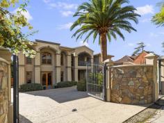14 Delamere Avenue NETHERBY SA 5062 Luxurious Mediterranean resort style home located in the prestigious suburb of Netherby, in close proximity to Adelaide’s finest schools. Built on a generous piece of beautifully manicured land, 1489m2 (approx) this spacious residence was constructed in 2009 by the current owners and boasts grand proportions of 933m2 (approx). You will be impressed with the floorplan which comprises, five double bedrooms including guest accommodation, eight bathrooms, formal lounge / dining, kitchen with butler’s pantry with meals / family room, home theatre, library / office, two laundries, cloak room, under cover entertaining area and 15m solar heated lap pool. From the elegant entrance, with cloakroom, you step down into the “Great Room”, formal lounge / dining, with parquetry flooring and over 3m high ceilings with intricate cornices and ceiling rose with chandelier. This leads into a dream kitchen which was built to entertain, with marble benchtops, Miele stainless steel appliances, including two ovens, two dishwashers and a butler’s pantry with dining / family area flowing on to the undercover alfresco dining terrace with a marble open fireplace and gas BBQ overlooking the picturesque landscaped gardens and solar heated lap pool. Take the lift or walk the timber staircase to the bedrooms upstairs, the master suite boasts a his and her ensuite and walk-in wardrobes, andprivate balcony with fabulous views of the city to the north. An additional three double sized bedrooms each with their own walk-in wardrobe and ensuite and two of these with private access to their own balcony with hills views. All are serviced by a built-in kitchenette with bar fridge, instantaneous boiling water & microwave nook. A large private apartment houses the fifth bedroom / guest quarters / teenagers retreat downstairs with its own ensuite and walk-in robe has a full kitchen with solid jarrah cabinets and natural stone benchtops which flows through to a private living area / games room with gas log fireplace. An office / studio / library / 6th bedroom with parquetry flooring has exclusive entry from the front of the home, ideal for work from home endeavours. A home theatre adds to the entertainment capabilities. There are two laundries, one for summer leading outside and another with plenty of internal hanging space and storage off the garage which accommodates three cars and has a workshop & plenty of storage. The home conserves energy with 5 separate air-conditioners and ceiling fans to all bedrooms for year round comfort plus 90,000L underground rainwater tank to service the home and automatic irrigation system to the grounds.