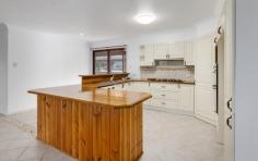 40 Burrawan Dr Wauchope NSW 2446 $770,000 * Highest residential town property on a corner block, approx 3894m2 with subdivision potential STCA * Approx 128m2 of residence with 3 bedrooms, 2 bathrooms & parking for 3 vehicles * Tiled throughout living area * Tidy timber kitchen with 4 gas burners, dishwasher & new rotisserie electric oven * Master has ensuite with large walk-in robe * Other 2 bedrooms with built-in robes * Solar power panels * Yard has tidy established gardens, covered spa awning, colorbond garden shed & cubby house * Colorbond garage with 2 roller doors, attached carport for 1 vehicle