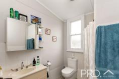 102 Tumut Street Adelong NSW 2729 $460,000 - $500,000 A rare find in the centre of town with an approximate 3,035m2 double allotment block with over 40m of street frontage and backing on to the beautiful Adelong Creek. The house itself a 100-year-old cedar cottage, with modern amenities such as gas heating and cooking, three large bedrooms, main with walk-in robe, two living areas, separate dining and lounge, sun filled sunroom, two large verandahs to take in the afternoon sun and enjoy the beautiful landscape and settled fruit trees and grape vines at the back and the beautiful rose garden to the front. Enjoy an afternoon by the creek while sitting in the covered alfresco shed which is fitted with a stainless steel bench and its own separate electricity metre. There is also a 40" container and 2 garden sheds plus a chicken coop, the garden beds are ready to try your hands at growing your own vegies and the fruit trees are well established. This property has too many amazing features not to inspect, only approximately 18 kilometres to Tumut and a short walk to the centre of Adelong town centre which boasts a bank, hairdresser, supermarket, post office, cafes, pub, and other lovely little shops. Other features- - 2x large rainwater tanks - Internal laundry - Second separate toilet - Double carport & rear vehicle access to back yard - Fully fenced house yard - Two separate electrical meters Located on the Snowy Mountains Highway and nestled against the banks of the Adelong Creek, the Adelong township is an ideal base to explore the Snowy Mountains region. Surrounded by picturesque valleys and hills, the Adelong area is home to award winning primary producers. The town has an extensive early pioneer and gold mining history with buildings along the tree lined main street recognised by the National Trust of Australia. Whether you're exploring the Adelong Falls, heritage listed Gold Mill ruins, or relaxing in the historic pubs and cafes, history and hospitality go hand in hand in the charming town of Adelong.