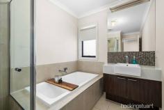 54 Benalla Ave Eynesbury VIC 3338 $859,000 - $889,000 If you have been searching for that extra household space and a leafy, serene outlook, the Eynesbury township may just be what you are looking for. This exceptionally, well-maintained property along with a versatile floorplan has plenty of room for the entire family, is surrounded by green, open spaces and is only a short commute to Melbourne CBD. Situated on 846m2 allotment (approx.) the double storey home accommodates four generous sized bedrooms upstairs, including an expansive master suite, complete with premium window finishings, walk-in robe and en-suite. The remaining bedrooms all feature walk-in robes with two offering tranquil views over the back garden and golf course. A spacious family room, main bathroom with separate toilet and large linen cupboard service the first floor. On the ground floor, you have the perfect study or third living area as well as double door access to a multi-purpose room, ideal for those requiring guest accommodation, theatre room or extra home office space. Wall-to-wall stacker doors seamlessly connect the home with the outdoors and bring in a wealth of natural light to the open plan dining, kitchen and main living area. The spacious alfresco area overlooks a sparkling, inground swimming pool with solar heating, fire pit/bbq area and manicured gardens with natives and succulents, this is the perfect place to unwind, away from the daily grind. Featuring a bounty of extras including ducted heating, evaporative cooling, split system, 900mm stainless-steel oven, dishwasher, exceptional walk-in pantry, Double car remote control garage with internal access and drive through access, landscaped front and rear gardens, separate laundry and two linen/storage cupboards. Perfectly positioned in the highly sought-after Benalla Avenue and close to the local primary and pre-school, heritage-listed homestead, leafy parklands and future town centre. This is one not to be missed!