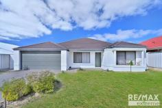 36 Compar Rd Banksia Grove WA 6031 $400,000 - $500,000 Whether you’ve been searching for your first home, one that caters for a growing family, or an amazing property to add to your investment portfolio; look no further, as this exceptional 4×2 home has everything you need including large bedrooms, multiple living areas, alfresco, and a colossal backyard for those energetic kids! Don’t miss this brilliant opportunity – CALL NOW to arrange your private viewing. • Located towards the back of Banksia, vibrant lawns and tidy garden beds set the tone for this stunning home, boasting amazing street appeal on an impressive 619sqm (approx.) block. Make the most of this lovely location as you have multiple schools, shops, cafés, gyms, parks, public transport and so much more at your doorstep. • Upon entrance be immediately impressed by the spacious front lounge, accompanied by the master bedroom which is nicely secluded at the front of the home and features a walk-in robe, split system air-conditioning and quality carpets. It is complemented by a neat and tidy ensuite with corner shower, toilet, vanity and storage. Be sure to fit queen beds in the three additional bedrooms, all with built-in robes, carpets, roller blinds and split system air-conditioning to all. • If you like to get creative when it comes to mealtime, you’ll really appreciate what’s on offer here! Overlooking the dining and living area this well-appointed kitchen features extensive bench space for food preparation, stainless steel appliances, double fridge recess, built-in pantry, plus plenty of drawer space and cupboards for storage. • Step outside to a gigantic backyard with a paved alfresco and huge lawn area, perfect for the kids, pets and entertaining guests. Let your imagination run wild with the potential to extend the alfresco and create the ultimate entertaining area, install a massive pool with summer right around the corner, or build a granny flat for additional loved ones (all subject to relevant approvals). Extras: Secure double car garage with rear access, shoppers’ entrance, laundry + walk in linen, double fridge recess, 4 x split system air-conditioning units, splash back, solar panels, 619sqm block plus more!