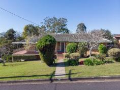 19 Kareela Avenue Lismore Heights NSW 2480 $625,000 Located on the northern ridges in a desirable neighbourhood with easy access to the CBD, schools and the Lismore Base Hospital is this elevated brick and tile three bedroom family home. All three bedrooms feature built-in wardrobes while two have ceiling fans. The home has a modern bathroom and kitchen, the beautiful timber floors flow out to the large open plan lounge room and you can sit back and relax on the tiled front balcony capturing northerly views to the ranges. Internal stairs lead you down to the huge garage with extra workshop space. Mature gardens surround the home along with generous off street parking. Ideally suited to first homebuyers, young families or would make a solid investment.