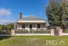 18 Sydney Street Tumut NSW 2720 Set upon a very generous 1,012m2 allotment and boasting a two-bedroom brick style cottage and additional granny flat to the rear, you will love the character and space afforded in the brick cottage on Sydney Street. Do not miss your opportunity, call today to book your private inspection. Premiere Features: - Two bedrooms with high ceilings and master boasting large built-in robes - Updated main bathroom with combined shower over bath and single vanity - Great size sun filtered kitchen with ample bench space and storage options, with stainless appliances and split system air conditioning - Open plan dining, centrally located and directly off kitchen with ceiling fan - Formal living area with wood box fire heater and ceiling fan - Large internal laundry to the rear of the plan - Linen storage - Separate toilet - Quaint fully covered rear entertaining area overlooking the rear yard - Great sized rear yard with vehicle access - Double bay lock-up garage with additional workshop area and third roller door for side access - Granny flat boasting large bedroom with built in robes and split system air conditioning, with ample space for additional amenities and storage options - Ensuite to bedroom with shower, single vanity and toilet - Charming front deck fully covered - Fully fenced 1,012m2 allotment