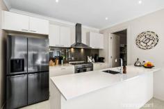 54 Benalla Ave Eynesbury VIC 3338 $859,000 - $889,000 If you have been searching for that extra household space and a leafy, serene outlook, the Eynesbury township may just be what you are looking for. This exceptionally, well-maintained property along with a versatile floorplan has plenty of room for the entire family, is surrounded by green, open spaces and is only a short commute to Melbourne CBD. Situated on 846m2 allotment (approx.) the double storey home accommodates four generous sized bedrooms upstairs, including an expansive master suite, complete with premium window finishings, walk-in robe and en-suite. The remaining bedrooms all feature walk-in robes with two offering tranquil views over the back garden and golf course. A spacious family room, main bathroom with separate toilet and large linen cupboard service the first floor. On the ground floor, you have the perfect study or third living area as well as double door access to a multi-purpose room, ideal for those requiring guest accommodation, theatre room or extra home office space. Wall-to-wall stacker doors seamlessly connect the home with the outdoors and bring in a wealth of natural light to the open plan dining, kitchen and main living area. The spacious alfresco area overlooks a sparkling, inground swimming pool with solar heating, fire pit/bbq area and manicured gardens with natives and succulents, this is the perfect place to unwind, away from the daily grind. Featuring a bounty of extras including ducted heating, evaporative cooling, split system, 900mm stainless-steel oven, dishwasher, exceptional walk-in pantry, Double car remote control garage with internal access and drive through access, landscaped front and rear gardens, separate laundry and two linen/storage cupboards. Perfectly positioned in the highly sought-after Benalla Avenue and close to the local primary and pre-school, heritage-listed homestead, leafy parklands and future town centre. This is one not to be missed!