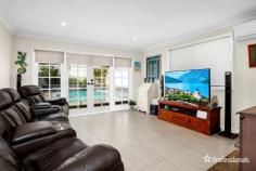 14 Dilga Crescent Erskine Park NSW 2759 $974,950 - $1,049,950 Situated in a location of convenience a short walk to all local amenities including local primary and high school, local shopping centre, parks, childcare centres, transport and easy access to M4 & M7 motorway, is this renovated family home. * At the heart of this house is a lovely renovated kitchen with Caesar stone benchtop Miele dishwasher, 90 mm Smeg gas cooktop with a marble feature. * 4 good size bedrooms, main with newly renovated ensuite and WIR, all others with built in robes and ceiling fans and quality floating timber flooring throughout * Flowing design consisting of formal lounge on entry, separate dining space off the kitchen featuring an abundance of light including a skylight that at the push of a button closes which helps keeping warm in winter and cool in summer along with a rear family room with French doors opening onto rear yard and to complete the package a warm combustion wood fired heater with quality ceramic tiling. * Beautifully presented and updated main bathroom with separate bath, shower and toilet, renovated ensuite and separate 3rd toilet * Lock up tandem carport with rear access in private and child friendly manicured front and rear landscaped yards with an awesome alfresco entertainment area overlooking your sparkling salt water pool, perfect for entertaining. Complete the package with solar panels for electricity regeneration, solar hot water systems as well as being freshly painted, put this on the must see list today you won’t be disappointed