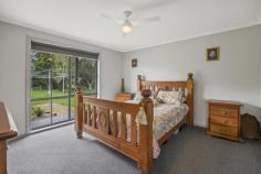 10 Girdwoods Rd Tarraville VIC 3971 If you're looking for peace and quiet just 4 minutes from boat launching, this is sure to appeal. Set on approx. 12.8 acres of fertile, flat and well fenced land with unlimited water from the bore, sealed road access and views to the distant hills. Sandstone residence sited to capture the warm northerly aspect and outlook over feature dam with jetty, filled with natural light and luxuriously appointed. Stunning kitchen with gleaming cabinetry, modern appliances and granite look breakfast bar to light filled dining area. Separate spacious living room. 3 large fitted bedrooms, master with walk in robe and ensuite bathroom. Family bathroom, separate w.c and fitted laundry. Quality soft furnishings, ducted vacuum, zoned RC/AC and ceiling fans, solar and mains power, double auto garage. Outside is sure to delight with so much shedding - 18 x 9 x 4.5m with mezzanine, power, lights and water giving space to store the boat plus workshop space. Adjoining annexe for caravan or float. Chook pen, hot house, fenced orchard, vegetable gardens, cattle race, abundant water storage. Quiet location just 100m from the Tarra River, 8 mins from Yarram, 4 mins from the historic fishing village of Port Albert. Come and discover the good like in this picturesque location.