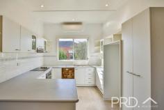 18 Sydney Street Tumut NSW 2720 Set upon a very generous 1,012m2 allotment and boasting a two-bedroom brick style cottage and additional granny flat to the rear, you will love the character and space afforded in the brick cottage on Sydney Street. Do not miss your opportunity, call today to book your private inspection. Premiere Features: - Two bedrooms with high ceilings and master boasting large built-in robes - Updated main bathroom with combined shower over bath and single vanity - Great size sun filtered kitchen with ample bench space and storage options, with stainless appliances and split system air conditioning - Open plan dining, centrally located and directly off kitchen with ceiling fan - Formal living area with wood box fire heater and ceiling fan - Large internal laundry to the rear of the plan - Linen storage - Separate toilet - Quaint fully covered rear entertaining area overlooking the rear yard - Great sized rear yard with vehicle access - Double bay lock-up garage with additional workshop area and third roller door for side access - Granny flat boasting large bedroom with built in robes and split system air conditioning, with ample space for additional amenities and storage options - Ensuite to bedroom with shower, single vanity and toilet - Charming front deck fully covered - Fully fenced 1,012m2 allotment