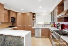 14 Dilga Crescent Erskine Park NSW 2759 $974,950 - $1,049,950 Situated in a location of convenience a short walk to all local amenities including local primary and high school, local shopping centre, parks, childcare centres, transport and easy access to M4 & M7 motorway, is this renovated family home. * At the heart of this house is a lovely renovated kitchen with Caesar stone benchtop Miele dishwasher, 90 mm Smeg gas cooktop with a marble feature. * 4 good size bedrooms, main with newly renovated ensuite and WIR, all others with built in robes and ceiling fans and quality floating timber flooring throughout * Flowing design consisting of formal lounge on entry, separate dining space off the kitchen featuring an abundance of light including a skylight that at the push of a button closes which helps keeping warm in winter and cool in summer along with a rear family room with French doors opening onto rear yard and to complete the package a warm combustion wood fired heater with quality ceramic tiling. * Beautifully presented and updated main bathroom with separate bath, shower and toilet, renovated ensuite and separate 3rd toilet * Lock up tandem carport with rear access in private and child friendly manicured front and rear landscaped yards with an awesome alfresco entertainment area overlooking your sparkling salt water pool, perfect for entertaining. Complete the package with solar panels for electricity regeneration, solar hot water systems as well as being freshly painted, put this on the must see list today you won’t be disappointed