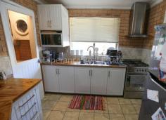22 Catherine Street Castletown WA 6450 $425,000 Renovated to reveal a spacious family home featuring formal lounge with reverse cycle air-conditioner, open kitchen and dining with bi-fold doors opening to a sunken, sun-lit games room. Kitchen has a country feel with white cupboards, timber bench tops and a walk-in pantry, with adjacent laundry. There are 4 spacious bedrooms, 2 study nooks, a stylish master bedroom with ensuite and walk-in-robe and a central main bathroom/semi ensuite. The large shed can be used as a workshop or outdoor games room. Features 2 garden shed, retic to front garden, 2 water tanks (one feeds kitchen) and double garage under the main roof.