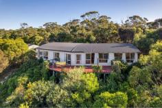 6 Cathcart Street Swansea TAS 7190 One lucky purchaser is going to be the proud owner of this incredible home. Whether you are looking for your forever home, a holiday home for the family or an Airbnb this is a unique offering to the market place. Set back from the road and elevated capturing the incredible water views this home captures an abundance of all day sun and offers a large entertaining deck that is an ideal place to sit back, relax and watch the world go by. Boasting a great floor plan, high ceilings and open plan living all taking in that amazing outlook. There are three fantastic size bedrooms, bathroom with a large double shower and corner spa. This much loved home has only had one owner that has loved the lifestyle on acreage and so close to the beach. It really is the best of both worlds. The kitchen has been thoughtfully designed with ample bench and cupboard space. This opens on to an undercover and enclosed rear deck. There is also a formal and informal living/dining area. There is a separate double garage with workshop or home office area. A fully fenced paddock at the bottom of the property and all this located in a highly sought after location on the popular East Coast. Unique and quality homes likes this certainly do not come on to the market often.