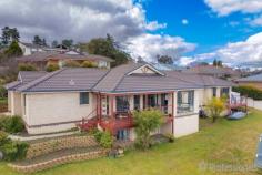 30 McCarthy Crescent Armidale NSW 2350 $640,000 to $700,000 This lovely home is set upon spectacular North Hill with commanding views over town. The layout will appeal to the larger family with extra room for guests as well as plenty of room in the workshop/man cave under the home. This home is not one to be missed, book your inspection today! Five well sized bedrooms – four with built in wardrobes. Two master suites are complete with luxurious en-suites. The main three way bathroom services the remaining three bedrooms. The gas heating will keep the home cosy all winter, while the reverse cycle will ensure you don’t overheat in the summer. Double lock up garage with internal access into the home as well as 4KW solar panels: Canadian Solar; Inverter: German. Two options for living or dining depending on your needs, with a carpeted enclosed room at the front of the home which could easily be formal dining or media room. Open plan living, dining & kitchen. The modern functional kitchen is fitted with updated appliances and copious amounts of pantry & cupboard space. Entertain family & friends with outdoor undercover entertaining area. Easy to maintain yards with added fish ponds and the option to keep the aquarium. Other features include, timer in meter box to run hot water at daytime from solar, a second smaller hot water tank has been installed underneath kitchen sink bench to get instant hot water in the kitchen tap and bamboo flooring – double tongue and groove.
