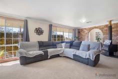 1 Finlayson Close Armidale NSW 2350 $420,000 to $460,000 Cheerful and cosy single level living beckons with this classic brick home. Perched within a popular North Hill setting, it features a kitchen with ample storage, open plan dining area and a separate living room. As well, it offers three bedrooms and a modern, newly renovated bathroom – and is kept toasty in winter with a wood-burning fireplace and cool in summer with reverse cycle air-conditioning. A single lock-up garage with internal access to the home is an additional bonus, while outdoors enjoy the undercover patio and a fully fenced backyard. Kids and pets can roam freely here and soak up the space of this 758m2 block, plus there is rear access. Occupying a quiet location, near PLC and Ben Venue Public School, its sunny and soothing interiors will ensure you feel right at home.