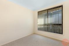 3 / 6 Ghilgai Avenue Aberglasslyn NSW 2320 $439,000 This modern 2 bedroom villa is situated in a well maintained complex of units, located close to public and private schools, local shops, transport, Stockland Green Hills, Maitland Private Hospital and the new Maitland Hospital and is only a thirty minute drive to the Newcastle CBD. A neat and tidy kitchen is on offer for the avid cook of the family and showcases ample storage/bench space, quality appliances including a gas cooktop and electric oven for family convenience. The master suite is incredibly spacious with a large built in wardrobe. A sense of light flows throughout the remaining bedroom that benefits from a large built in wardrobe. The bathroom is centrally located and is complete with both a bathtub and shower for family convenience. A single garage with internal access is provided for your convenience. Split system air conditioner for all year round comfort. Glass sliding doors off the kitchen / dining merge flawlessly out onto the private, low maintenance, fully fenced courtyard.