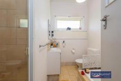 6 Russell Rd Greenmount WA 6056 $439,000 With a potential to sub divide, this Greenmount property is more than just a home. Raise a family, keep some chickens, walk the kids to school and celebrate milestones in the big backyard; this 3-bedroom home is the perfect stage for family life. The 1964-built brick and tile home has high ceilings, decorative cornicing, and timber floors throughout. Set in a friendly neighbourhood, minutes from Greenmount Primary and St Anthony’s, the home sits well back from the road behind a sweep of reticulated lawn and gardens and boasts a family-sized backyard. 3 bedrooms 1 bath 2 WC 1964-built brick and tile Open plan kitchen/meals Lounge with bay window Polished timber floors Outdoor entertaining Fully fenced backyard Single garage door 1019 sqm subdivide STA Walk schools parks bus As you step inside from the small front porch, this Greenmount home’s high ceilings and polished timber floors ensure an immediate sense of welcome. A large bay window in the lounge washes the room with natural light heightening the sense of space and highlighting the family-friendly interior layout. An open-plan kitchen/meals with an electric oven and gas hob opens to a partially enclosed verandah and sheltered patio to offer a practical indoor-outdoor layout. The outdoor living zone overlooks the generous backyard and has ample space for seating, barbecuing and dining. It provides an ideal backdrop to impromptu alfresco dinners, memorable family get-togethers and relaxed weekends reading and dozing cocooned in the green oasis of the private backyard. A central hall leads from the shared living zones to a walk-through laundry, the family bathroom and three bedrooms. Polished timber floors and high ceilings in each bedroom create a delightful sense of calm. The family bathroom has a shower, tub, vanity and WC. A second WC adjoins the laundry. The fully fenced backyard of this 1019 sqm block offers an idyllic space for kids and pets to run and play; there is even room to keep chickens, build a cubby, and plant a vegetable garden. A single garage with a paved driveway for access sits to one side of the lot. Two sheds offer storage space for garden tools and equipment. A rich and rewarding future watching your family grow, marking milestones and making memories is easy to imagine in this home and this friendly neighbourhood.