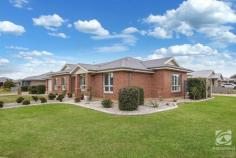14 Gilson Place Howlong NSW 2643 $629,000 Fully furnished, only a stone's throw away from one of the region's highest-rated golf courses, this modern home offers a hole-in-one for buyers of all levels. Built by locally renowned builder Glen Hall, the home comes fully furnished, allowing you to turn the key and start living! The large master bedroom features an oversized walk-in wardrobe and ensuite with a single vanity and separate shower. The remaining three bedrooms are spacious, offering all the luxuries including built-in robes, ceiling fans and shutters. The main bathroom is positioned close to the bedrooms and is stylish with a separate bath and shower. Thoughtfully designed with family in mind, there are several private living spaces to get away and relax. The living area towards the front of the home makes the ideal space for a parents retreat or home theatre, whilst the open central living area incorporates both the kitchen and dining area. Recently updated, the kitchen maintains a practical design and layout, including stunning stone bench tops, modern appliances and more storage than you can poke a stick at, along with an oversized island bench and breakfast bar. Perfect for year-round entertaining, the alfresco area is enclosed with windows and blinds, which creates an ambience like no other. The hybrid design allows you to have a free-flowing connection from the kitchen/dining area through to the entertaining area. The large shed has been positioned perfectly for several applications, with vehicle access through the double lock-up garage and perfect side access. An enclosed walkway from the shed and garage to the home allows for easy access in comfort year-round. Other notable features of this home include solar, ducted heating and cooling, irrigation, shutters on most internal windows and established gardens.