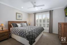 14 Gilson Place Howlong NSW 2643 $629,000 Fully furnished, only a stone's throw away from one of the region's highest-rated golf courses, this modern home offers a hole-in-one for buyers of all levels. Built by locally renowned builder Glen Hall, the home comes fully furnished, allowing you to turn the key and start living! The large master bedroom features an oversized walk-in wardrobe and ensuite with a single vanity and separate shower. The remaining three bedrooms are spacious, offering all the luxuries including built-in robes, ceiling fans and shutters. The main bathroom is positioned close to the bedrooms and is stylish with a separate bath and shower. Thoughtfully designed with family in mind, there are several private living spaces to get away and relax. The living area towards the front of the home makes the ideal space for a parents retreat or home theatre, whilst the open central living area incorporates both the kitchen and dining area. Recently updated, the kitchen maintains a practical design and layout, including stunning stone bench tops, modern appliances and more storage than you can poke a stick at, along with an oversized island bench and breakfast bar. Perfect for year-round entertaining, the alfresco area is enclosed with windows and blinds, which creates an ambience like no other. The hybrid design allows you to have a free-flowing connection from the kitchen/dining area through to the entertaining area. The large shed has been positioned perfectly for several applications, with vehicle access through the double lock-up garage and perfect side access. An enclosed walkway from the shed and garage to the home allows for easy access in comfort year-round. Other notable features of this home include solar, ducted heating and cooling, irrigation, shutters on most internal windows and established gardens.