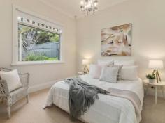 2 Crossley Street ERINDALE SA 5066 $1,700,000 Situated in the heart of Erindale this elegant Tudor style residence with stunning original features and fantastic street appeal is positioned on approx 719m2 of manicured gardens, private and secure with intercom and automatic gates. Only a short drive for shopping at Burnside Village and The Parade Norwood and within walking distance to St Peters Girls School, Burnside Primary School and nature reserves Kensington Gardens Reserve, Michael Perry Botanic Reserve and Fergusson Park. Upon entrance through the double glass doors you are welcomed in to a traditional wide hallway with high decorative ceilings, ornate glass and polished floorboards. The flexible floorplan offers generous accommodation with four double bedrooms, built-in robes to three, a formal lounge and dining room both with brick fireplaces, stunning JAG kitchen with modern stainless steel appliances, black granite benchtops and ample cupboard space and rear extension includes the light and bright open plan living / dining with rear outlook to paved undercover entertaining area. There are two bathrooms, one being the family bathroom with bath / shower, vanity and toilet, and the second with shower, vanity and toilet. Large laundry with ample bench space & storage. Landscaped gardens with irrigation system, ample off street parking including large double carport and gas ducted heating and evaporative ducted cooling complete this wonderful opportunity to secure your piece of the highly sought after suburb of Erindale. Key features include: • Circa 1927 classic stone Tudor • High ceilings, polished timber floors & leadlight • Fireplaces to formal lounge & dining • Four double bedrooms (BIR to 3) • JAG kitchen with stainless steel appliances • Light & bright open plan living • Large laundry with ample bench & storage • Gas ducted heating & evaporative ducted cooling • Undercover entertaining area • Irrigated landscaped gardens • Off street parking including large double carport • Automatic gates & intercom
