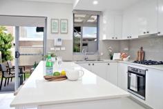 22 Myers Street Roselands NSW 2196 Behind an unassuming façade lies this surprisingly delightful, well-presented and light-filled duplex in the heart of Roselands. Offering a highly attractive layout, you will be greeted with an instant family retreat making it a superb choice for first home buyers and families seeking a convenient address. – 3 bedrooms with built-in wardrobes, two balconies and master with en-suite – Open living and dining area with outdoor flow for entertaining – Modern open plan kitchen with ceasarstone bench, brand-new appliances, gas cooking and dishwasher – 2 lavish designer bathrooms and powder room downstairs with 3rd toilet – Manicured landscaping and private backyard with covered alfresco – Freshly updated interiors with two air-conditioners, abundant natural light – Tiled flooring downstairs and floating floorboards upstairs – Automatic lock-up garage with internal access and off-street parking – Close to Roselands and Belmore shopping precincts, local schools and parks – Additional features: Internal laundry, video intercom, security screen door, skylight, storage shed. Offering low-maintenance luxury living, this full-brick home is designed for a relaxed family lifestyle with the privacy and tranquillity of a quiet street close to all amenities.