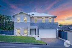 12 Sergeant Baker Drive Corlette NSW 2315 Cutting-edge in design and luxuriously detailed, this contemporary residence with multiple indoor and outdoor entertaining areas has been designed to offer a well proportioned, private and secure living environment in a prestigious locale. Optimizing privacy and filled with natural light, the luxurious interiors provide exceptional zoned areas for entertaining and daily living. Upon entry, an engineered suspended staircase leads you to the bedroom accommodation of the home which is completely separate to the main living hub of the home. There are four bedrooms in total plus a study, and the master bedroom has a walk in wardrobe and ensuite. The open plan living, kitchen and dining area features a modern colour palette with tiled flooring and double stacker doors leading out onto the outdoor undercover entertaining area. With the finest appliances and a superb array of cupboard and bench space, the kitchen has been equipped for the astute chef and features a four seater island bench with in built wine cellar storage. The home also offers ducted air conditioning and solar electricity. Naturally configured for outdoor entertaining, this beautiful property has a lap pool with small grassed area to accentuate low maintenance living. Situated an approx. a 800m walk to Salamander Bay Shopping Centre, schools, parklands, cafes and restaurants.