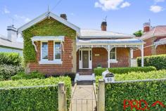 50 White Street East Tamworth NSW 2340 $750,000 Location, charm and history cannot be replicated. The 100 years that this beautiful home has stood, in one of Tamworth's most sought after streets, the stories, the gatherings, and the families that have had the privilege to call 50 White Street East Tamworth their home. This solid, olde, charming home is a solid as the day she was built. All of the character and charm remains. High ceilings, timber floorboards, gorgeous fireplace mantels, pressed metal and so many other features that you would expect from the era of a 1920's build. The owner has put her stamp on the home and has updated the kitchen and two bathrooms to a high end finish. Gorgeous vintage light fittings, stone bench tops, subway tiles, my favorite black and white bathroom colour palate and so many more features that only an inspection will allow you to appreciate and ooh and aah over. The back garden is a beautiful space. Established trees, hedges and a lovely quiet spot for you to chill after a busy day and enjoy a glass of wine. Car accommodation, side access and shared rear lane access. The location is a ten out of ten. Walking distance to town, beautiful Anzac park, Tamworth Public School and St Nicholas Catholic School. 50 White Street is situated amongst home of distinction, high resale value and is the address that you will never want to leave.