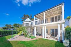 37 Irambang Street Nelson Bay NSW 2315 A rare offering to the market, sits this beautifully presented classic coastal home situated only 50m approx. to the waters edge in Nelson Bay. Standing out amongst the neighbourhood, the home features crisp white interiors, manicured hedges, north facing, water views and a spacious living spaces opening onto entertaining areas. Suited to a modern family, the residence has open free flowing areas to genuinely accentuate the space that is on offer. Allowing plenty of natural light to bask throughout the home, the front of the home has ample glass making sure it captures the northern sunlight. A showcase of both formal and informal living areas provides space for the entire family when they come to visit. There are five bedrooms of accommodation, and the master suite has been appointed the perfect parents retreat with your own living area, ensuite and walk in wardrobe framed by white plantation shutters. A simply breathtaking home made for the entertainer, just 50m approx. to the ocean, this is home is also walking distance to Nelson Bay marina and CBD.