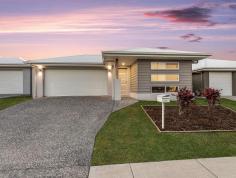 20 Amber Circuit Ripley QLD 4306 $609,000 This well maintained, 2019 built home is just what you've been after! With 4 bedrooms, a light and airy open-plan layout and a low-maintenance yard, this property is ideal for those looking at securing a beautiful family home in a vibrant and friendly community. Forget the hassle of building and enjoy moving into a quality-built home located minutes from parks, playgrounds, shops, primary and secondary schools, parks and local cafes. Property details: Tenanted until 21/08/2023 however, tenants are flexible and willing to move out asap Rented for $480/week 201m2 home on a 375m2 block Built in 2019 by Devcon Building Co. Inside: 4 bedrooms with built-ins, fans, fly screens and blinds Master bedroom with a walk-in robe, air-conditioning and an ensuite Ensuite is complete with a shower and vanity with Caesarstone bench-top Large open-plan, air-conditioned kitchen, living and dining area Second living/media/rumpus room Kitchen with Caesarstone benches, free-standing electric cooktop, oven, dishwasher, fridge space, microwave space and pantry Main bathroom with shower, vanity, bath and separate toilet Internal laundry with backyard access Undercover alfresco area NBN internet Location: This home is located in the visionary new Ripley Valley community. As one of the largest growth areas in South East Queensland, Ripley is a fantastic mix of community spirit and "at-your-doorstep" convenience, making it the ideal place to raise your growing family. This terrific location is only minutes from the Ripley Town Centre, Ripley Valley Primary and Secondary Schools, parklands, public transport and easy access onto both Cunningham and Centenary Highways.