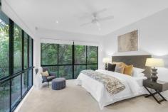 48 Seventh Avenue St Lucia QLD 4067 $2,900,000 Rising from the rainforest, this beautiful home is in one of St Lucia’s most prized locations. Whisper quiet, surrounded by lush greenery, this surprisingly low maintenance home is ready for the next owners. One of three exclusive residences situated in a private gated lane, a stone's throw from the University of Queensland, and in the Ironside State School and Indooroopilly High School catchments. Cleverly designed with a focus on comfortable living and beautiful light, this home will appeal to small and large families alike. Open plan large kitchen/dining and sitting room lead straight onto the deck, and pool. Soaring three meter plus ceilings and walls of glass overlooking lush rainforest. All bedrooms and living areas are of a good size with pool and expansive decks straight from the living area. Features include; - North east orientation maximising light and breezes - Open plan living and dining with gourmet kitchen - Master bedroom, with walk in robe and ensuite - Separate home office - Two living areas - Wine cellar and dumb waiter - Glazed entry foyer soaring ceilings - Reverse cycle air conditioning throughout - Outside entertaining overlooking sparkling pool - Plenty of storage inside and outside - Lush low maintenance tropical gardens - Electric gate entry - 827m2 of land - Triple garage with additional parking for 2 cars - Transport and local amenities close by