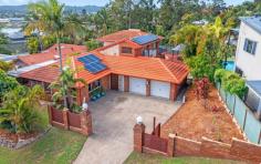 12 Currant st Elanora QLD 4221 $1,300,000 Prominently situated on the top of the hill in a cul-de-sac with stunning Lake Views and refreshing breezes, this 5 Bedroom Family Home has the size & space you need, in one of the most sought-after locations. Includes:- - Master Bedroom (Parents Retreat) on the second level, Up the bamboo stairs is a quiet private place away from the rest of the home. Purpose built and beautifully lit with natural light makeup/hair styling studio, to suit a beauty based or creative home business - with lots of storage and bench space. Leading into the over sized bedroom with A/C, walk in wardrobe and draws galore, a well-appointed ensuite with a beautiful lake view – what more do you need !!! - 4 Bedrooms downstairs with fans, perfectly located to the recently remodelled Bathroom, with Shower, Sink, Deep Bath and Seperate Toilet - Take a walk across the Bamboo flooring in the large naturally lit family sized Living Room onto the side deck to take in the Lake View Sunsets - Large kitchen with newly fitted appliances, great storage and a pretty cool servery window directly onto the deck to serve your family / guests - A large deep solar pebbled concrete heated pool (1.3m - 1.9m) surrounded by a huge deck and Bali hut, with high fences for total privacy, perfect for entertaining large parties or simply chilling out with with the family. Efficiently running two independent pool pumps, one for pool cleaning and one for solar heating, the pool is salt water enabled and currently running on chlorine and is just waiting for you to Dive In. - Large driveway easily fits 3 cars and the double garage has a drive through leading to a cement slab, prefect for your boat, jet ski, jacuzzi or trampoline. There is also a large garden adjacent to this driveway that has the potential to be converted into a much larger driveway caravan and boat pad. - Solar Powerhouse, with 3 Independent Solar Systems - 35 Solar System - Solar hot water - Seperate Solar pool heater - Solar ready for Electric car charging at the Additional Notes/Details:- - Popular Pre, Junior and Senior Schools - Woolworths and 19th Avenue shopping centre 3 mins walk away. - Beaches are in easy reach - Surrounded by lush off leash dog parks next to rivers and the ocean. - Tallebudgera and Palm Beach only 8 minutes by push bike. - Easy access to the Pacific Highway for any day/work trips with Gold Coast and NSW borders close by Installation and cooling:- -The house has been fully insulated in the ceilings with quality installation, except for the garage. -The house has four high-quality air-conditioners, and It is inexpensive to cool. -There are Ceiling fans in for of the five bedrooms. Several secret storage areas: Internal:- -At the rear of the house large roof cavity already With floorcovering, With at least 3 m2 of storage. -Storage in the roof cavity of the garage with floor covering with at least 6 m² of storage Deck storage: -Lots of Storage under both front and rear decks. -Rear deck with the most storage, with under deck waterproofing a large area, perfect for storing spare timber and building materials, at least 20 m² of space -There is spare Merbau decking and other hardwood And spare building materials. General: -House is gas ready with outlets for heaters, and all the connectors are there for a quick kitchen gas conversion. -Purpose-built colour bond fences combined with strategically placed gardens and palms give this house 100% privacy. -This home has been loved for the past 20 years and is well maintained. -The street, this has always been a great street, friendly people.