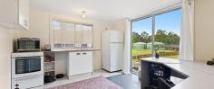 175 Princes Hwy Bodalla NSW 2545 $1,160,000 “Bealga” – The current owners have maximised the property’s potential by creating many different areas and infrastructure that could bring in a healthy income, or homes for extended family members. Each building and garden space is separately fenced, along with a chook pen and established orchard. The property is 5110 m2 and zoned RU5 Village. Main House: 2 bed 2 bath- approved as main residence. Was two one bedroom units but has been converted back to a single residence with two bathrooms, two bedrooms, two kitchen and open living area with a wood burning fireplace. Covered veranda and a back deck with views of Bodalla's green pastures. Currently not tenanted but could achieve rent of $300 per week (larger side), $160 per week (bedsit) or as one residence approximately $400 per week. Second House: Approved as the second dwelling. Open plan kitchen, living space and bedroom with a separate bathroom/laundry. Spacious layout with cathedral ceilings. Currently rented month to month at $220 pw but should be able to achieve higher rent at $300 pw. Bunk house: This building is approved as a bunkhouse/studio and comprises of a separate bedroom, bathroom/laundry, lounge/dining space and a kitchen. Also under the same roof line with a roller door access on the outside and an internal door is 6 m x 6 m shed space. It is currently rented month to month at $230 pw however should achieve a higher price at $300 pw. Garage and workshop: With a total area 6 m x 6 m and split in two sections. One side Has a small kitchenette, 2.6 m x 1.8 m working cool room, separated bedroom space, bathroom/laundry with external access. The other shed section has extra high roller doors at both ends and is perfect for a trades person or a handyman to run his business from or parking for your caravan and large boat. Produce Market: Fenced space and has its own disabled bathroom, water and power on the site. Perfectly set up to sell your produce or plants. Great high traffic position right on the highway in Bodalla in a 60 km zone. Cook house/run and Animal pens: Currently running chickens and the other fenced areas have been used as shelters for pigs and calves. There is an established orchard with a mixture of fruit trees, plus there is extra flat land to put more buildings (STCA), park caravans or boats or just plant to your hearts content.