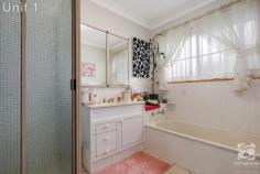 8 Norm Court Wodonga VIC 3690 $930,000 Nestled in a quiet court and backing onto a church, these three strata-titled units are spaciously laid out over the 1298m2 allotment, with mature trees and lush lawns in a well-kept and private yard. All three units are tenanted, with long-term residents making this the perfect set and forget investment! Each unit is comprised of two very generous bedrooms with built-in robes and ceiling fans, a bathroom, a separate toilet, laundry, a large open-plan kitchen, and living and dining areas. The timber kitchens boast ample storage and bench space, along with a breakfast bar. Comfort is ensured year-round with a reverse-cycle wall unit and a gas wall heater in each unit. All units have a single attached garage and an adjacent additional parking space. Another very sought-after feature for any tenant is the secure, decent-sized backyards. Units 1 & 2 have a shaded pergola area also. The rental appraisal is $300p/w per unit, giving a possible yield of 5.03% upon renewal of the leases. This property is strata titled but has no strata management fees, as each unit in the complex shares the same owner.