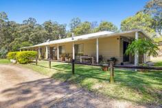17 Park Avenue Woolgoolga NSW 2456 If you're looking for the opportunity to have a rural lifestyle combined with close proximity to arguably one of the best costal locations in New South Wales, then 17 Park Avenue should be on your inspection list. Entering the property 'Tall Timbers', you are greeted with a timbered driveway and spring fed dam. Following up the driveway of this 2.4 hectare property you are led directly to the selectively landscaped four bedroom, two bathroom low set home. The wonderful North Easterly orientated outlook over your property will best be enjoyed of a morning, sitting on the wrap around patio with your tea or coffee. The master bedroom boasts walk in robe and ensuite. Separated from the other three bedrooms by the open plan lounge and formal dining, which is well appointed including combustion heater and separate sunroom. The country style kitchen is based in the heart of the home with scenic vistas from the the front and rear windows. Car accommodation comes in the way of a separate ColorBond, double lock up garage. Additionally, there is another garage with carport which extends to a large workshop. The cleared paddocks provide the best spot for your beloved animals and fruit trees have been planted with the future in mind, this will provide the home grown nourishment that is hard to find on residential allotments. With a short drive to Woolgoolga township, Main Beach, Woolworths, schools and sporting fields, this property will be sure to attract a lot of interest.