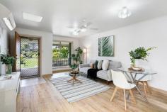 2A Bennett St Brighton SA 5048 $565,000 - $595,000 In the perfect Brighton position, this gorgeous 1980's homette is everything you could wish for in a highly-sought investment or live-in requiring minimal upkeep. Attractive front gardens and lawn around a winding garden path and porch with picket fence make for a most welcoming first impression, which won't be undone when you step inside. Updated with floating floors, a bright front living and dining area capturing lovely morning light is overlooked by a most functional U-shaped kitchen with raised breakfast bar, wall oven, double sink, fridge recess and plenty of storage and bench space. Two generous bedrooms each enjoy the comfort of carpet, built-in robes, ceiling fans and views to the backyard, serviced by a large sky-lit bathroom with huge shower and a separate w/c. A larger-than-you-would-expect backyard of lawn and garden beds offers plenty of space for little legs and home gardeners to do their thing, with extra legroom readily available at the Gemmell Green Reserve and Playground (pictured) and Jack Chaston Park, each within a few hundred metres. Alfresco entertaining is made easy courtesy of a northerly-aspect side courtyard with pergola accessible from the kitchen. We also adore: - Skylights to the living/dining and kitchen - Split system air conditioner + ceiling fan to living/dining - Spacious separate laundry with outside access - Secure single garage with courtyard access - Freshly painted A superb Brighton location - zoned for Brighton High with Westfield Marion Shopping Centre, Brighton Primary School, Warradale Kindergarten, bus and train transport and all the amenities and eateries of Brighton Road at your fingertips, all just a couple of kilometres from Jetty Road and Brighton's beautiful beaches and with top-rated Banks and Brown café a short stroll down the road ready to keep you caffeinated.