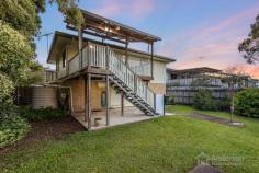 43 Avington St Keperra QLD 4054 $700,000 Situated close to all your needs, this modest, original condition 1960’s home offers the perfect place for a family or new investors looking to renovate a classic Queensland home. Close to everything you need, situated on 5492m of land in one of Brisbane north’s best suburbs, this home isn’t one to miss! Across two levels, the home comprises of three well-sized bedrooms, the master equipped with built-in robe, fully renovated family bathroom with separate toilet, spacious kitchen and dining space, two large living spaces across both levels, a multi-purpose downstairs room with workshop area, and two spacious decks at both the front and rear of the home. Tidy and classic, the high-set home has been fitted with ceiling fans and air conditioning for those warm Brisbane summers, with access to the back deck directly from the meals area, ideal for entertaining all year round. Of note, the enormous lower-level multi-purpose living space can be used for a number of things including a secondary rumpus room, theatre or games room, the kids’ hideaway, or as additional storage for the workshop space. A double-car, secure remote garage allows secure parking, with direct access to laundry facilities and to the covered patio area. The spacious and low maintenance yard space is fully fenced to ensure safety and fun, complete with an iconic Hills Hoist clothesline. Directly opposite Keperra Country Gold Club, and a short distance from a number of parks, including the Ferny Grove Aqua Park, bowls and cricketing clubs, off leash dog parks, and plenty of beautiful walking tracks, lifestyle is this property’s best feature. With Great Western shopping centre a ten-minute drive away – a planned $22 million makeover in the works – your weekend groceries and shopping is sorted. Further services like medical, dental, and pathology are a short walk or even quicker car trip away. Close to both primary and secondary schools and Ferny Grove train station, the property is the perfect location for families or busy workers looking for an easy commute into Brisbane’s city or further north to the coast. Westfield Chermside is only 20 minutes away, with plenty of restaurants, cafes, and local shops situated between. Don’t miss this excellent opportunity to secure an iconic Queensland style of home. Investors, first home buyers, experienced renovators or small families are ideal for this property and should act quickly before it’s too late! Get in touch ASAP to secure your viewing.