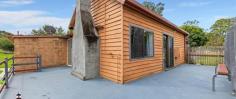 175 Princes Hwy Bodalla NSW 2545 $1,160,000 “Bealga” – The current owners have maximised the property’s potential by creating many different areas and infrastructure that could bring in a healthy income, or homes for extended family members. Each building and garden space is separately fenced, along with a chook pen and established orchard. The property is 5110 m2 and zoned RU5 Village. Main House: 2 bed 2 bath- approved as main residence. Was two one bedroom units but has been converted back to a single residence with two bathrooms, two bedrooms, two kitchen and open living area with a wood burning fireplace. Covered veranda and a back deck with views of Bodalla's green pastures. Currently not tenanted but could achieve rent of $300 per week (larger side), $160 per week (bedsit) or as one residence approximately $400 per week. Second House: Approved as the second dwelling. Open plan kitchen, living space and bedroom with a separate bathroom/laundry. Spacious layout with cathedral ceilings. Currently rented month to month at $220 pw but should be able to achieve higher rent at $300 pw. Bunk house: This building is approved as a bunkhouse/studio and comprises of a separate bedroom, bathroom/laundry, lounge/dining space and a kitchen. Also under the same roof line with a roller door access on the outside and an internal door is 6 m x 6 m shed space. It is currently rented month to month at $230 pw however should achieve a higher price at $300 pw. Garage and workshop: With a total area 6 m x 6 m and split in two sections. One side Has a small kitchenette, 2.6 m x 1.8 m working cool room, separated bedroom space, bathroom/laundry with external access. The other shed section has extra high roller doors at both ends and is perfect for a trades person or a handyman to run his business from or parking for your caravan and large boat. Produce Market: Fenced space and has its own disabled bathroom, water and power on the site. Perfectly set up to sell your produce or plants. Great high traffic position right on the highway in Bodalla in a 60 km zone. Cook house/run and Animal pens: Currently running chickens and the other fenced areas have been used as shelters for pigs and calves. There is an established orchard with a mixture of fruit trees, plus there is extra flat land to put more buildings (STCA), park caravans or boats or just plant to your hearts content.