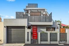 7 Lord St Richmond VIC 3121 $1,820,000 MODERN URBAN EDGE DESIGN This captivating three-level residence encapsulates the modern urban lifestyle and is only a stones throw away from some of the best features that the inner city hub of Richmond has to offer. Innovatively designed, this home offers three bedrooms on the ground level each with mirrored built-in robes. The master bedroom includes a large walk through robe and into a luxury ensuite with bath and separate shower. Private outdoor decking can be accessed from both second and third bedrooms accompanied by a study nook. Completing the ground floor is a luxurious full bathroom and laundry all with marble tile and chrome tapware. The first floor offers an expansive light-filled and spacious kitchen, with striking Calcutta marble benchtops and stainless steel appliances and walk in pantry. Attractive high quality Chestnut timber floors compliment the space leading out to a large alfresco area. Large bi-fold doors allow the open-plan space to seamlessly transition to the outdoors, conveniently transforming the first floor into the ultimate entertainers dream. A guest powder room completes this level. From the kitchen, the stairs continue up to a rooftop terrace complete with a second powder room. The terrace is ideal as an additional entertaining space or utilise the space as your very own urban garden! Built by specialized bespoke builders this home will be sure to fit your needs . Additional features include alarm and secure blinds, intercom system, heating and cooling and fully landscaped low maintenance gardens. Valuable off-street parking with lock up garage as well. Situated in close proximity to all the delights of Bridge Road shops and restaurants and with transport at your doorstep to take you straight into Melbourne CBD within 10 mins.