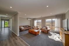 27 Ambleside Way Officer VIC 3809 $670,000 - $730,000 This stunning home on the north side of Officer is immaculately maintained and in near new condition. Offering three sizeable bedrooms, the master is accompanied by a beautifully presented ensuite and walk-in robe while the zoned secondary bedrooms boast double built-in robes and are serviced by the main bathroom and separate toilet located at the rear of the property. The entrance leads past a study nook into the heart of the home to a large open-plan living area, featuring a light filled lounge and generous meals area. The stunning hostess kitchen is an entertainers delight with stone work surfaces, a plethora of cupboards and draws and 900mm quality stainless steel appliances. Stepping outside to a private undercover alfresco area bordered by low maintenance garden and lush lawn. The creature comforts continue with ducted heating, 3 split systems, motorised window furnishings, LED lighting and a remote double garage with internal access. Close to quality schooling, including St Francis Xavier College, St Brigid’s Primary, Orchard Park Primary, amenities and parks such as Hicks Reserve its location is perfect for a wide array of purchasers.
