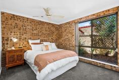 1/41 Eastern Street Gwynneville NSW 2500 $749,000 A delightful opportunity blending warm, classic comfort with all the ease of villa living, this quality home offers a superior first buy or downsizer. One of just two in the pet-friendly complex, it resonates with retreat charm - boasting spacious, free-flowing interiors with exposed brick feature walls and sleek bamboo flooring, and a fantastic backyard of an impressive size surrounded by beautiful greenery. Bill-busting solar power, alarm security and a large garage add masses of practical appeal, while the address itself gives coveted access to cafes and Wollongong CBD transport. Features: Cosy vibes minutes to local shops and Keiraville village Tree-lined level lawn - no neighbours to immediate rear Neat kitchen with dishwasher; full bath plus laundry Two big bedrooms - both with robes, master with ensuite A/C, garden shed, single garage with all-weather access Stroll to great local parks, schools, Uni and Botanic Garden