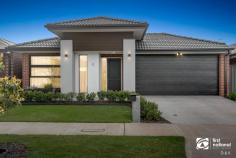 11 Nabro Street Truganina VIC 3029 $640,000-$690,000 Step in and feel an immediate attraction to this beautifully designed modern residence including a versatile family floor plan with a perfect balance of indoor and outdoor living spaces. The open plan dining and living area connects through large sliding doors with the outdoor alfresco and a perfectly landscaped backyard for an entertainer's dream. Carefully thought out and crafted with an emphasis on layout, light and modern open plan living. Comprising 3 or 4 bedrooms, depending on your preference. Master bedroom comes with a full en-suite, separate WC and an amazing, custom made walk in robe. Additional 2 bedrooms also with built in robes. In addition, there is an optional 4th bedroom, currently set up as a family room. The open plan design comes with a modern kitchen with walk-in pantry adjoining the dining/ living area. Perfectly incorporated study nook, ideal for working from home. Central bathroom with separate toilet and laundry with ample storage. A great list of inclusions inclusive of central heating, evaporative cooling, floorboards, plantation shutters to both bathrooms, modern black finishes and fittings throughout, double garage with internal access and much more. Close to the future Westfield Shopping Centre, around the corner from Dinosaur Park and playground, only minutes to freeway access and train stations.