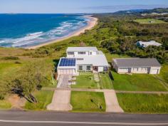 48 Ocean Street Woolgoolga NSW 2456 The very best the mid north coast has to offer and a rare opportunity to secure blue chip, waterfront front real estate on the stunning Woolgoolga Headland. Located high on the headland and surrounded by a world class ocean panorama, this prized location and luxury home is showcased by stunning ocean views from every room. You will experience privacy and opulence, with only the occasional passing whale and dolphins between you and the horizon. On entry to the home, you're immediately greeted with quality. The meticulous design creates a direct site line through the home to the exceptional views beyond. The entry level of the property is low set and offers 4 well proportioned bedrooms, each with impressive ocean views and built in robes. Also on this floor is a powder room, spacious laundry (complete with heated drying cupboard) and large main bathroom featuring a freestanding tub and stunning ocean views and self contained studio with its own bathroom and kitchenette. The master suite is the entire top floor of the home and provides incomparable functionality and decadence. Featuring an open ensuite with frameless shower and freestanding bath, walk in robe and a work space the entire floor offers sweeping ocean and island views. Outside is a private undercover parents retreat with views out to the horizon from either side. Breathtaking is the only word to describe the main living level, emphasizing this prized, elevated position. The open plan kitchen, living and dining room boasts flowing functionality and features high ceilings and wall to wall windows making it impossible to ignore the ocean and islands. Stacking doors opening out to the alfresco area create seamless indoor/ outdoor living and an entertaining space that will be the envy of your guests. The gourmet kitchen features professional ASKO appliances including a generously sized butlers pantry with additional storage space and a second dishwasher. Summer afternoons spent entertaining family and friends by the custom built glass edge pool are made easy with the luxuries of this home. Additional Features; White mahogany hardwood flooring Zoned ducted air conditioning system integrated kitchen vacuum system Smart lock front door entry LED lighting throughout A built in temperature controlled wine cabinet ASKO induction cooktop, steam oven, dishwasher Falmec, extra quiet range hood EnPhase 6kw micro inverter solar system (networked) Solar hot water The positioning of the nature reserve situated between the ocean and the property itself means that the land won't be built out and the potential to further develop and capitalise on the 1020m2 block with R3 zoning will give multiple options to maximise your position and investment. Properties in this unique headland location are rare and with the seaside village of Woolgoolga quickly becoming one of the most sought after locations on the Mid North Coast of New South Wales.
