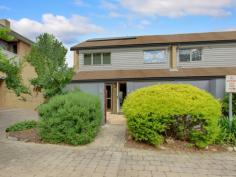 Unit 5/11 Howitt St The Avenue Kingston ACT 2604 $1,200,000 Situated in a highly regarded, quiet and private complex: "The Avenue" offers modern townhouse living in the heart of Kingston Village. Featuring quality updates throughout, this unique, Solar-efficient home has been fully renovated and presents as an ideal opportunity for the owner-occupier, downsizer or young family seeking access to blue-ribbon schools within the inner-south catchment area. With a highly functional floor plan, this townhouse features internal access from the remote-controlled garage into a full-sized Laundry, with adjacent powder room. There are also two separate living areas downstairs including a spacious dining room with adjacent Kitchen and separate lounge room with rear courtyard access. Energy efficiency is assured with quality double-glazed windows and additional insulation. Peace of mind for the security conscious is provided by Crim-safe window treatments. Unique to this home, there is an abundance of light from both the front and rear courtyards. Polished Tasmanian Blackbutt floor boards throughout are charmingly highlighted by exposed timber beams in the ceiling and the polished timber staircase. The living areas are serviced by reverse cycle heating and cooling providing year-round comfort. The well appointed kitchen overlooks the front courtyard and features plenty of cupboard space with an integrated Miele dishwasher, AEG brand induction cook top and built-in oven and microwave. Stone benchtops and contrasting splash backs accent the practicality of the Kitchen and a unique fold-out pantry complements the abundance of storage. There is also ample on-site visitor parking adjacent to the home and plenty of space to park a second car in front of your garage. The central staircase leads you to three well-proportioned bedrooms upstairs; each large enough for a Queen-sized bed. Due to this being an end-unit, the stairwell has the added advantage of a full length widow providing additional light throughout the home. The Master Bedroom has a walk-through robe providing access to the en-suite which includes a shower, toilet, custom-built vanity and in-slab heating. The 2nd and 3rd bedrooms also have built-in robes and there are internet and television connection points throughout the home. The master bedroom is segregated from the other two bedrooms by the family bathroom, which features new floor tiles, a custom-built vanity, shower, separate bath, large skylight and in-slab heating. In this fantastic location you will enjoy easy access to all amenities provided in the heart of Kingston, which is a mere five minute stroll away. You will be hard pressed to find anywhere else that can offer privacy, tranquility and an abundance of light-filled rooms and spacious living as you will find in this unique home. Features: North Facing, Three bedroom, two story townhouse Extensive fit-out of Solar Panels and back-to-grid inverter Polished Hardwood floors throughout Two separate living areas Fully renovated throughout with updated bathrooms, laundry, powder room and kitchen Two light filled courtyards Spacious Master with walk-through robe leading into an en-suite In-slab heating for both bathrooms Reverse cycle air conditioning ensures year-round comfort throughout the home Built in robes to all rooms Retractable awning over front courtyard Solar panels Additional car space and ample on-site visitor parking