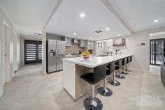 24 Enfield Turn Carramar WA 6031 This huge 5/6-bedroom, 2-bathroom property has so much space for the whole family! Located opposite Peter Turner Park & close to all local amenities this stunning home is guaranteed to impress! Features & benefits include: * Double door entry * Entrance hall with shoppers’ access from the garage * Study / home office / 6th bedroom * Family area * Kitchen with breakfast bar, feature bulk head, double fridge / freezer recess with cold water feed, 2 single drawer dishwashers & a large walk in pantry * Large dining area * Home theatre * Activity area with built in shelving * Master bedroom with large walk-in robe & ensuite with double shower, vanity & separate WC * 4 further spacious bedrooms with built in robes * Family bathroom * Well-appointed laundry with floor to ceiling, sliding door linen closet * 2nd WC * Ducted, reverse cycle air conditioning * Outdoor entertainment area * Generous grass area * Easy care gardens * Garden shed * Extensive liquid limestone driveway with plenty of parking * Double, remote garage * Large 641 sqm block * Close to schools, shops, The Carramar Golf Course, transport & all other local amenities.