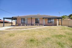 11 Welch Way Warnbro WA 6169 Set in the quiet back streets of Warnbro sits this fantastic 3 bedroom, 1 bathroom brick and tile home with a massive backyard that boasts a large powered workshop and plenty of room for a granny flat. Ideally located just 850m from the glorious water's edge and stunning coastline, this home resides on a generous 779sqm and is a few minutes drive from local schools, shops and parks. With new floors, fresh paint, a modernised bathroom and an updated kitchen you won't want to miss out on this one! - Reverse cycle split system air conditioning to the master bedroom and living area - Long hallway gives access to the bedrooms, bathroom and laundry - Built-in robes to master and one of the minor bedroom offers a robe recess - Electric cooking appliances, rangehood, overhead cupboards and fridge recess - Skirting boards, skylight in kitchen, double linen cupboard and gas bayonet - Security screen doors to the front, rear and laundry doors - Gated access to the rear through the carport - A paved flat patio out the back overlooks the spacious backyard on bore reticulation